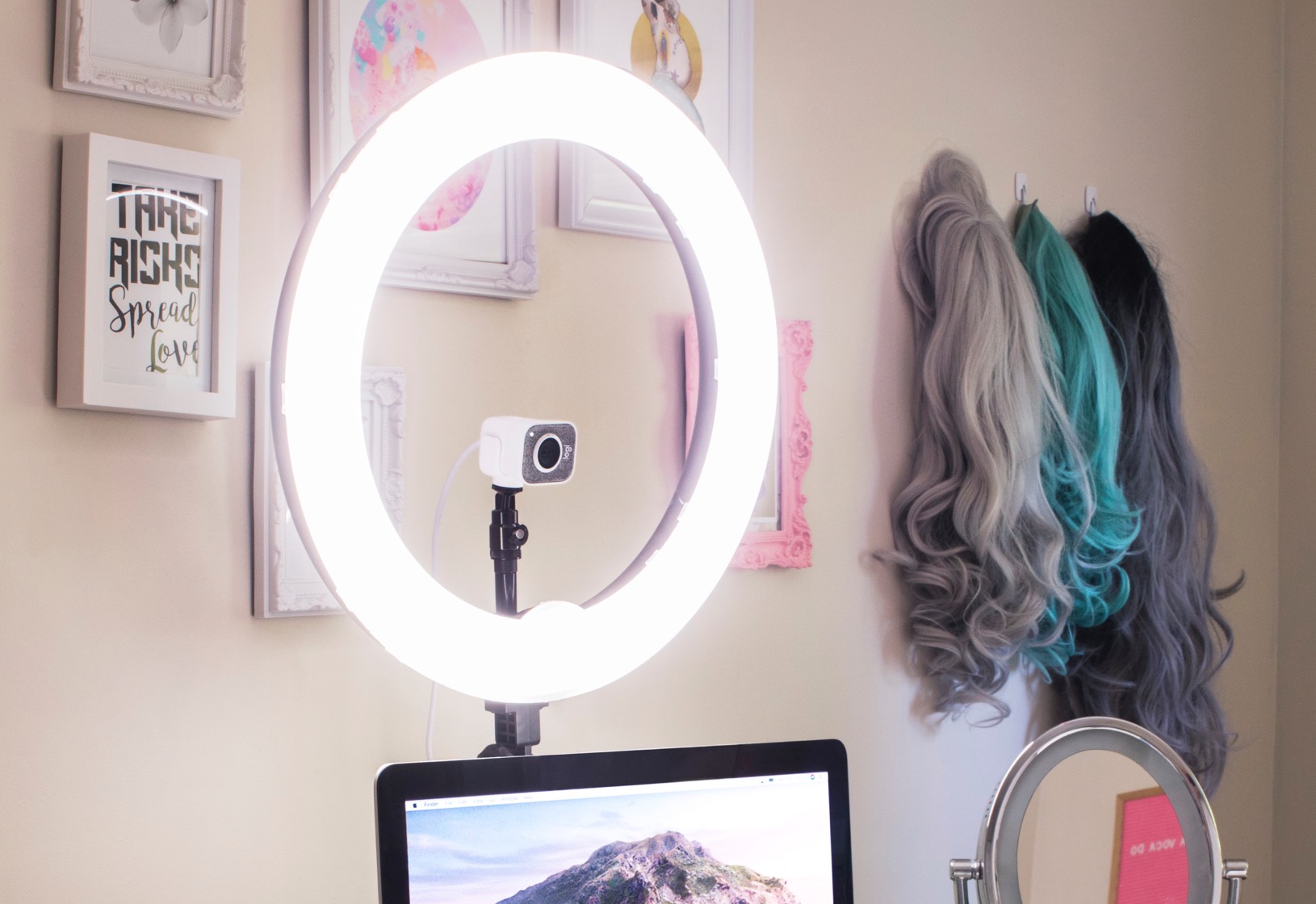 A ring light is a circular light that fits around your camera lens, providing even illumination for whatever you’re shooting.